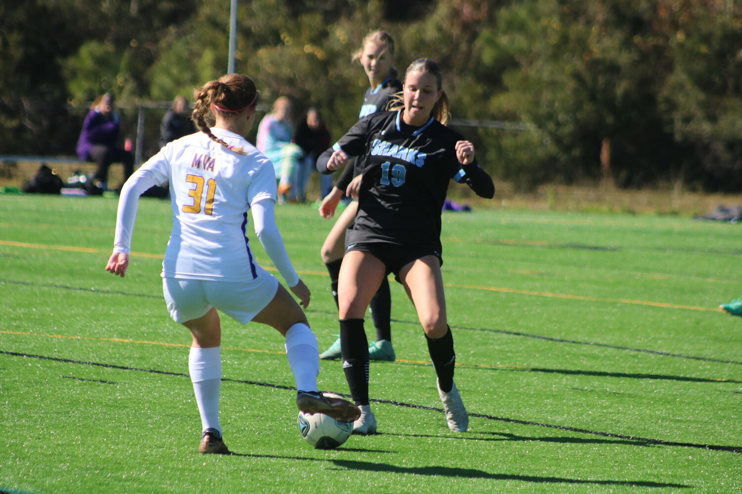 Hadley Conway fights to win possession.